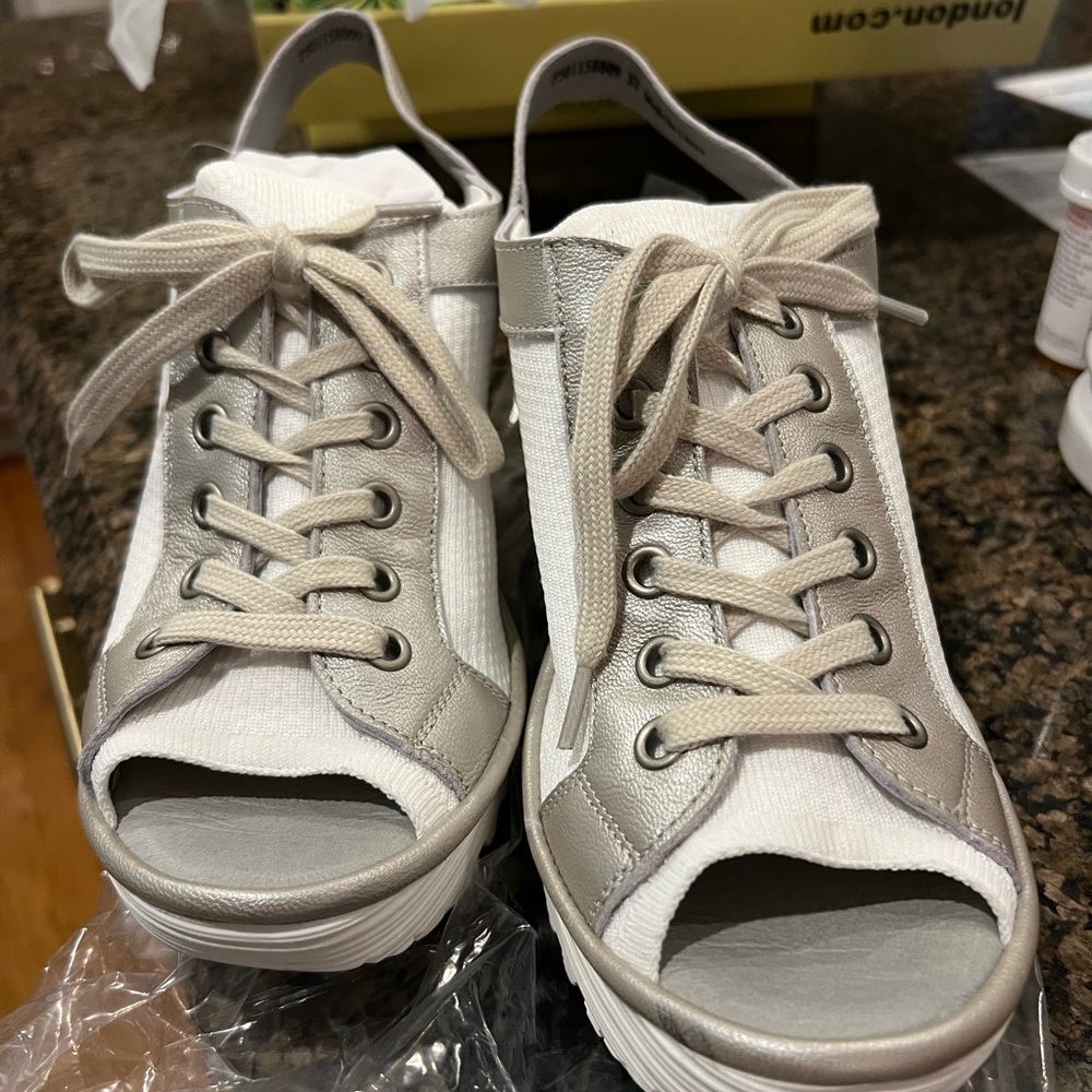 Never worn. Fly London